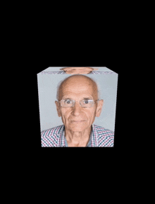 an elderly man with glasses is shown in a cube