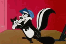 a cartoon of a skunk wearing a police hat holding a dog .