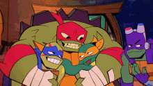 a group of teenage mutant ninja turtles posing for a photo