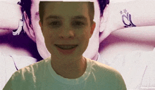 a young man with braces on his teeth is smiling in front of a picture of another young man