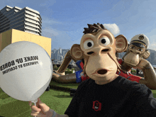 a man wearing a monkey mask is holding a white balloon that says make up boxed