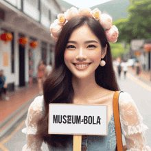 a woman wearing a flower crown holds a sign that says museum-bola