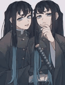 a couple of anime characters with long black hair are standing next to each other .