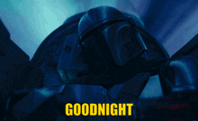 a picture of a robot with the word goodnight in yellow