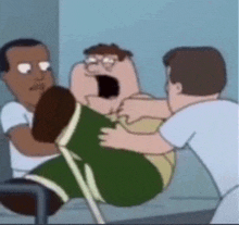 a cartoon character is being held by two men in a hospital bed .