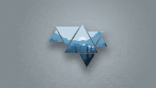 a triangle with a picture of mountains and trees in it