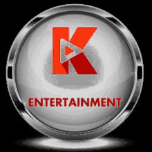 a silver button with a red k and the words entertainment on it