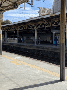 a train station with a sign that says taiwan 6