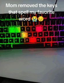 a colorful keyboard with the words mom removed the keys that spell my favorite word on it