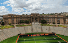 a football field with the word tigers on the field