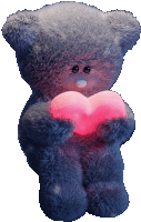 a gray teddy bear holding a pink heart