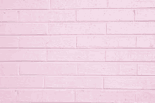 a close up of a pink brick wall with a row of bricks .