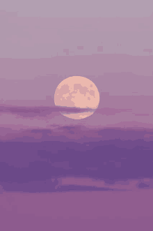 a full moon in a purple sky