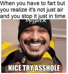 a man with a beard and nose ring is smiling and says nice try asshole on the bottom