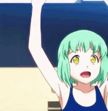 a girl with green hair and yellow eyes is wearing a blue swimsuit