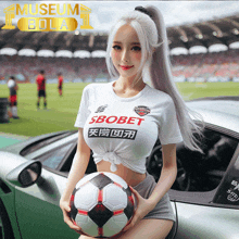 a woman holding a soccer ball in front of a car that says museum bola 1