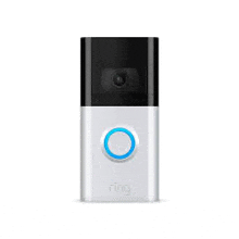 a white ring doorbell with a blue button on it .