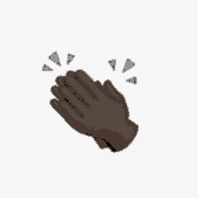 a close up of a pair of black hands clapping .