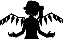 a silhouette of a person with wings on their back