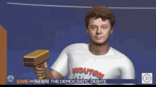 a man in a mouton powered t-shirt is holding a gun