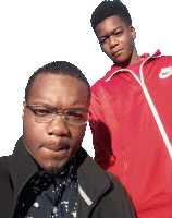 two men are posing for a picture and one is wearing a red nike jacket