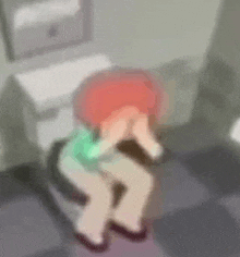 a blurred image of a person sitting on a toilet .