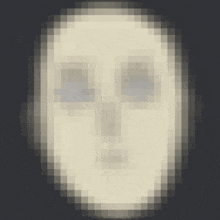 a pixelated image of a face with blue eyes