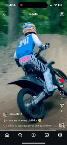 a screenshot of a person riding a dirt bike with the number 341 on their jersey