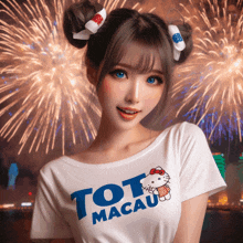 a girl wearing a shirt that says tot macau stands in front of fireworks