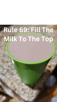 rule 69 : fill the milk to the top is written above a green cup of milk