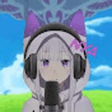 a girl with purple ears is wearing headphones and holding a microphone in a field .