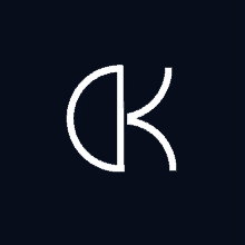 a white letter k with a circle around it on a black background