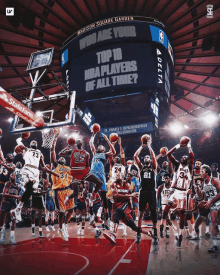 a group of basketball players playing in front of a scoreboard that says top 10 nba players of all time