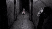 a dog is standing in a dark hallway in a video game .