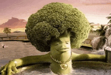 a cartoon character made out of broccoli is laying in a jacuzzi .