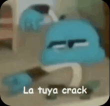 a cartoon character is sitting on the floor with the words `` la tuya crack '' written on it .