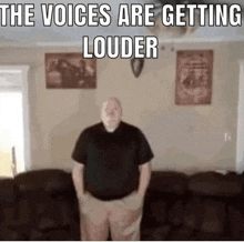 a man standing in front of a couch with the words " the voices are getting louder " written above him