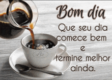 a cup of coffee is being poured into a saucer with the words bom dia on the bottom