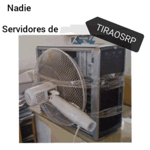 a picture of a computer with a fan attached to it and the words nadie servidores de tiraosrp above it