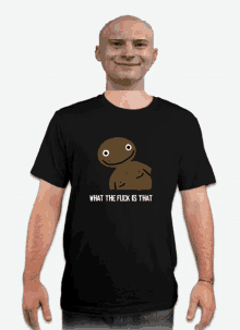 a man is wearing a black t-shirt that says " what the fuck is that "