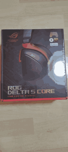 a black and red box for a gaming headset called rog delta s core