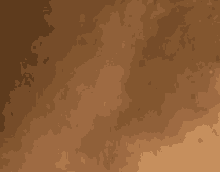 a close up of a brown background with a lot of dust and smoke coming out of it .