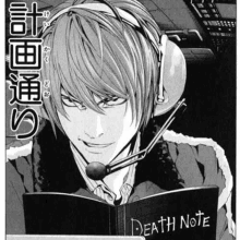 a man wearing headphones is reading a death note book .