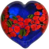 a blue heart shaped object with red flowers on it