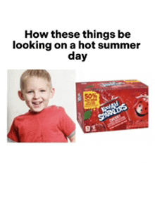 a boy in a red shirt next to a box of kettle corn sprinkles