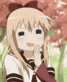 a blonde anime girl with a bow on her head is making a funny face with her hands on her mouth .