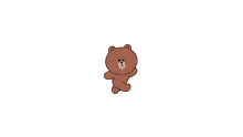 a brown teddy bear is standing on a white surface