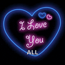 a neon sign in the shape of a heart says i love you all