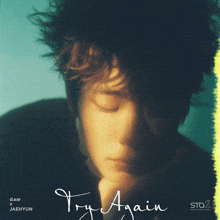 a man with his eyes closed is on the cover of a try again album