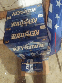 a stack of keystone light beer boxes